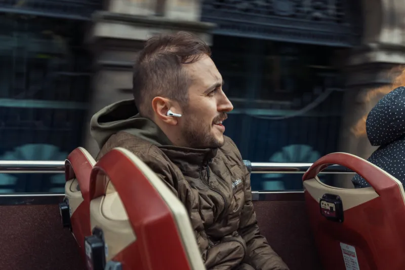 Why the Voice in Your Earbuds Feels Like Your Oldest Friend